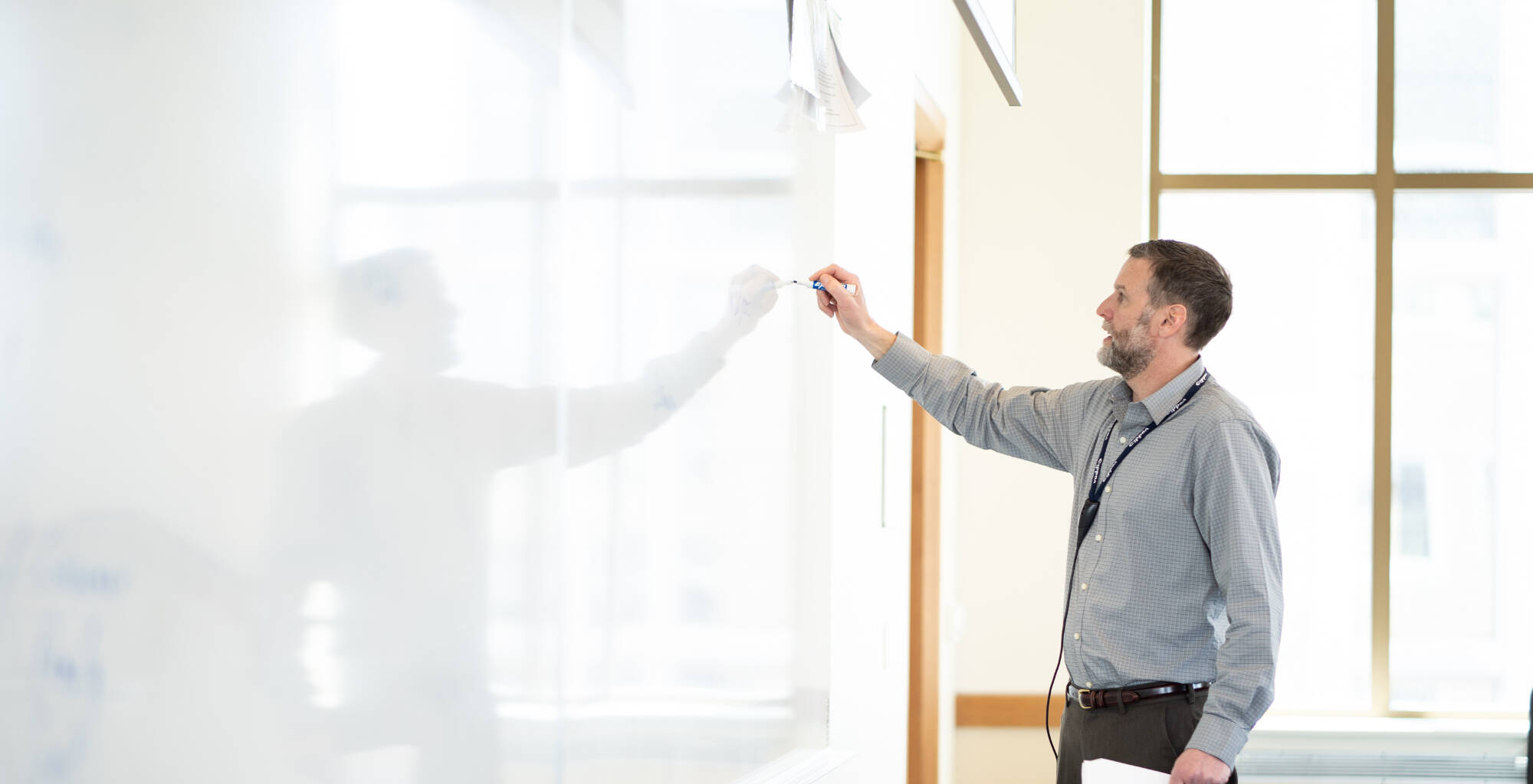 Chris Hinsch Drawing on Whiteboard